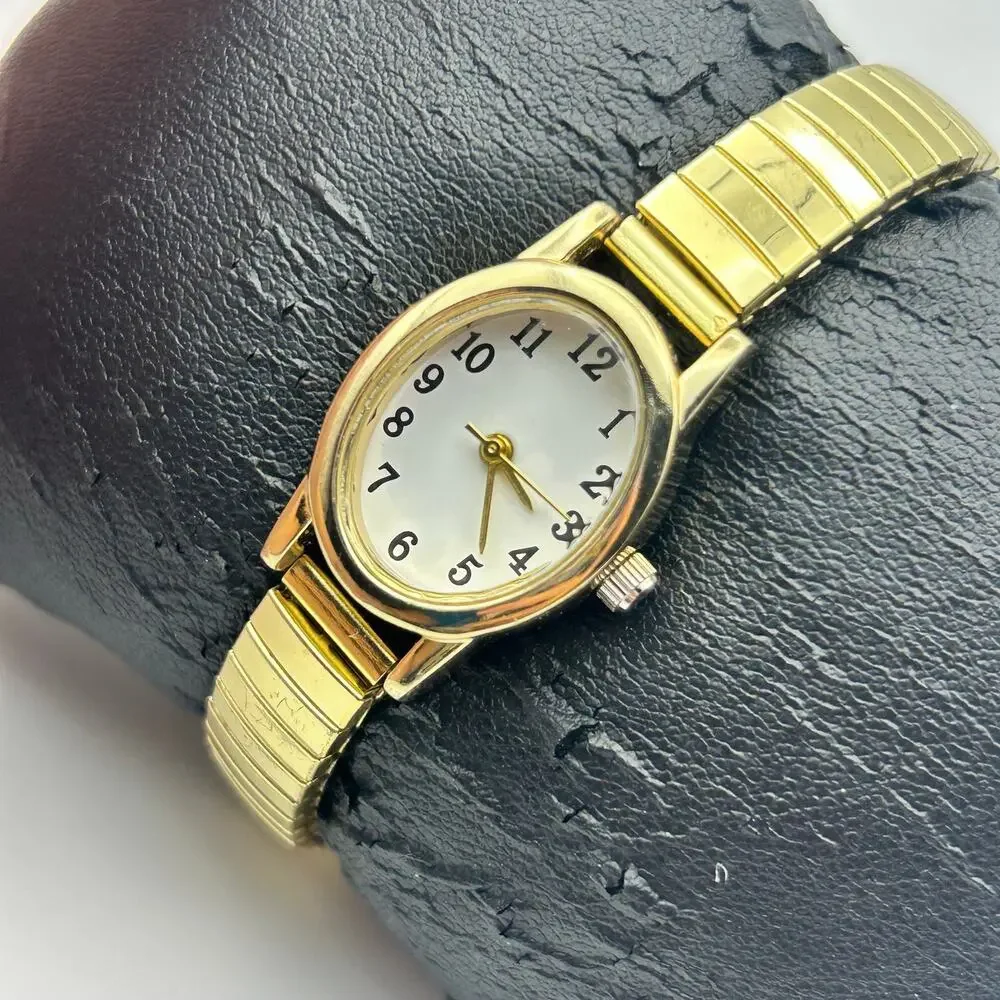 Gold-tone Oval Case Stainless Steel Stretch Band Women’s Watch Working